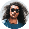 man with long hair and sunglasses