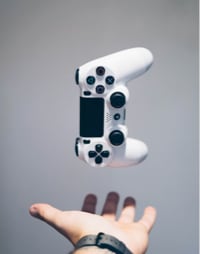 game console controller floating up open hand