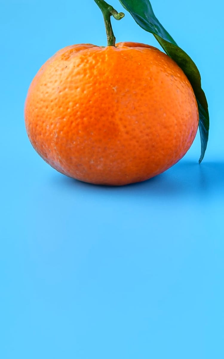 orange with blue background